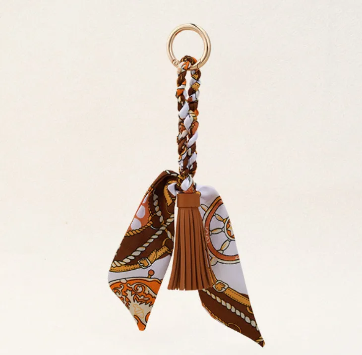 Leather Bow Tassel Bag Charm detail 1