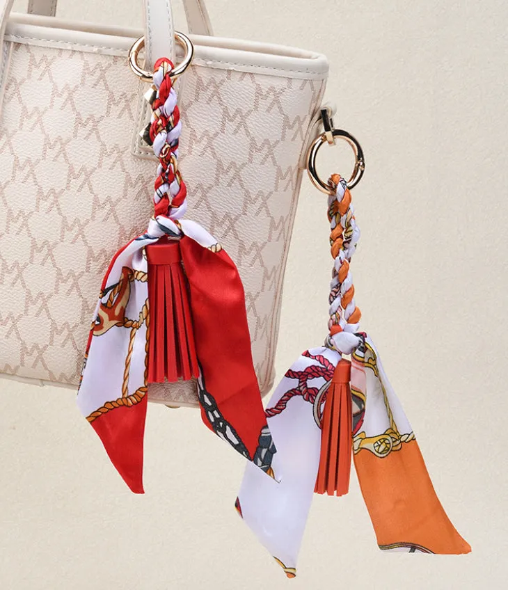 Leather Bow Tassel Bag Charm detail 4